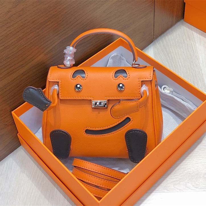 Smile Doll Bag Genuine Leather Mini Handbag with Top Handle and Crossbody Strap detail image 17