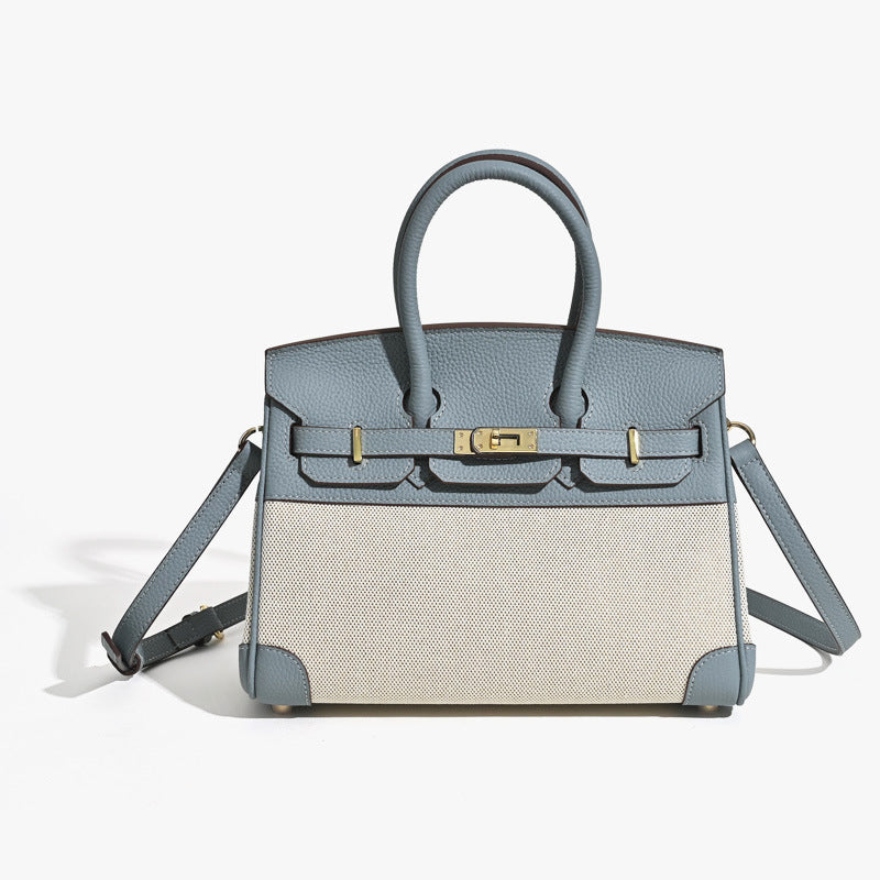 Top Handle Bag in Pebbled Grain Leather & Canvas with Gold-Tone Twist Lock detail image 7