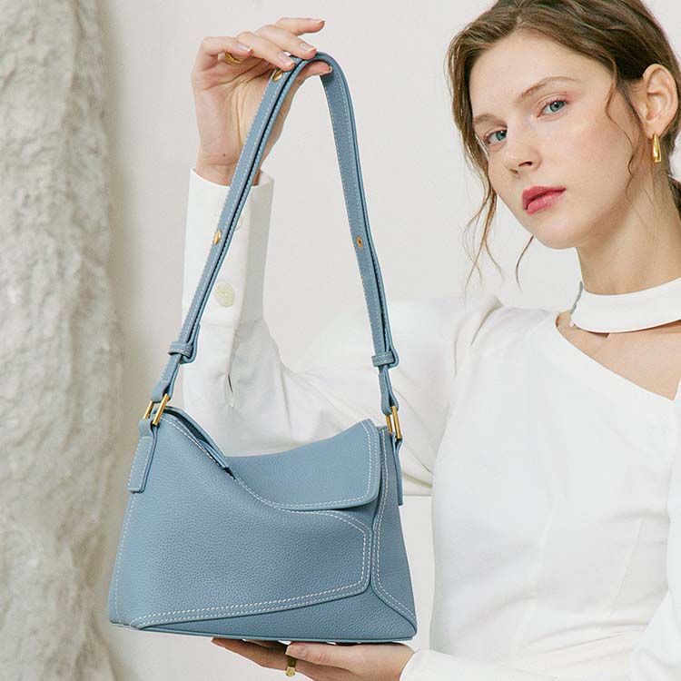 Geometric Dumpling Leather Crossbody Bag with Adjustable Strap detail image 14