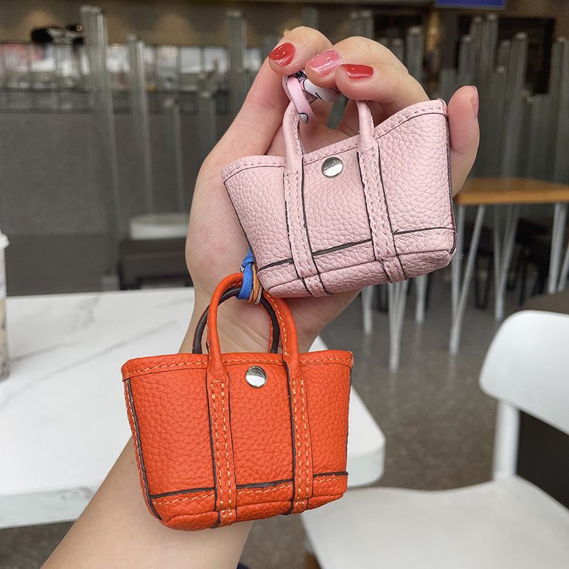 Mini Tote Bag Charm and AirPods Pro Holder in Top Grain Leather detail image 2