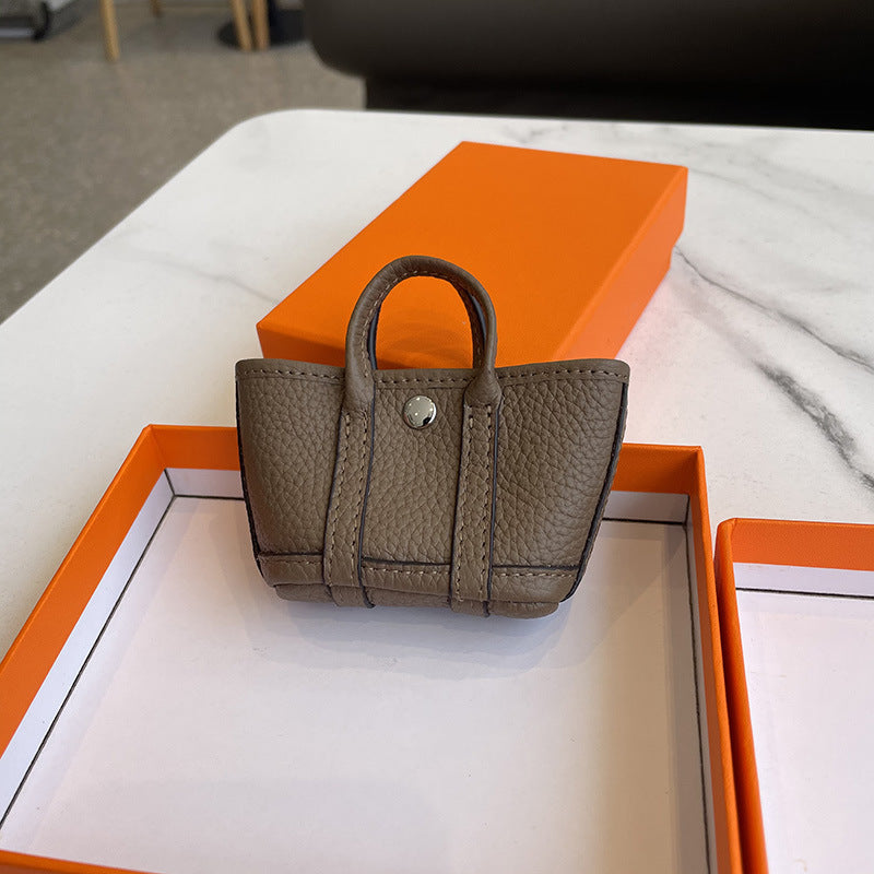 Mini Tote Bag Charm and AirPods Pro Holder in Top Grain Leather detail image 12