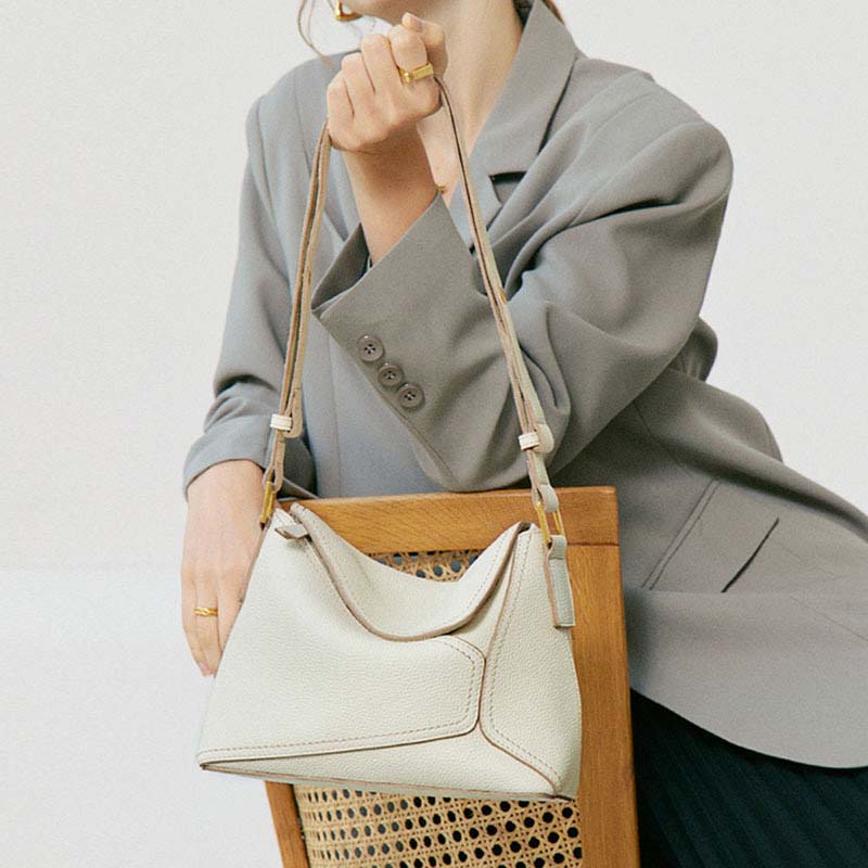 Geometric Dumpling Leather Crossbody Bag with Adjustable Strap detail image 2