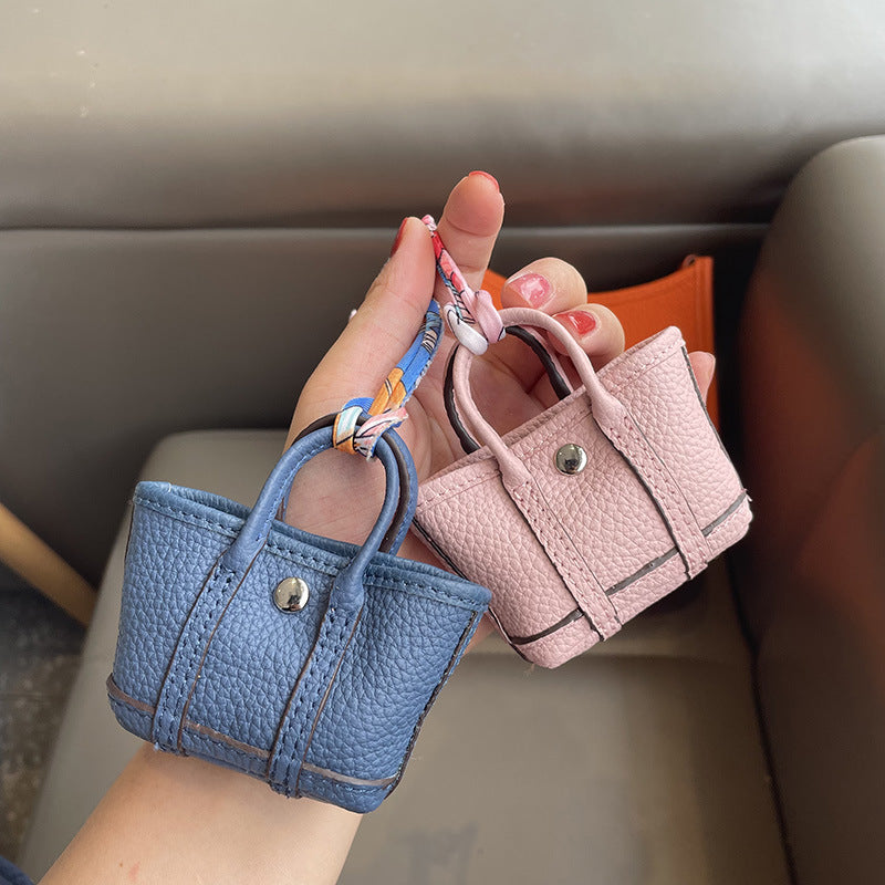 Mini Tote Bag Charm and AirPods Pro Holder in Top Grain Leather detail image 3