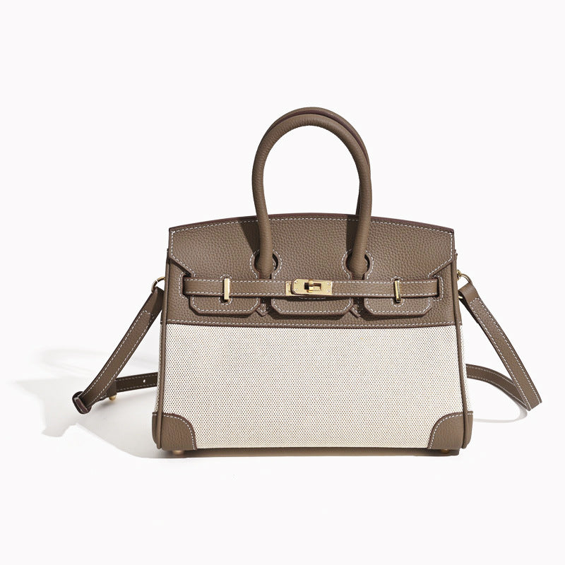 Top Handle Bag in Pebbled Grain Leather & Canvas with Gold-Tone Twist Lock detail image 6