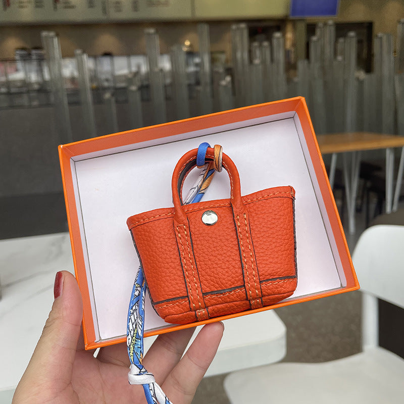 Mini Tote Bag Charm and AirPods Pro Holder in Top Grain Leather detail image 5