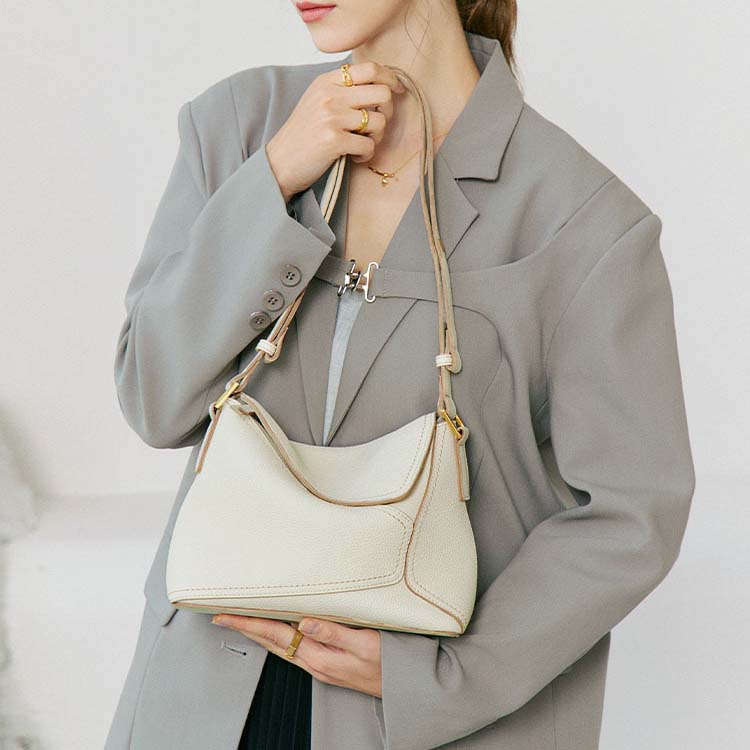 Geometric Dumpling Leather Crossbody Bag with Adjustable Strap detail image 5