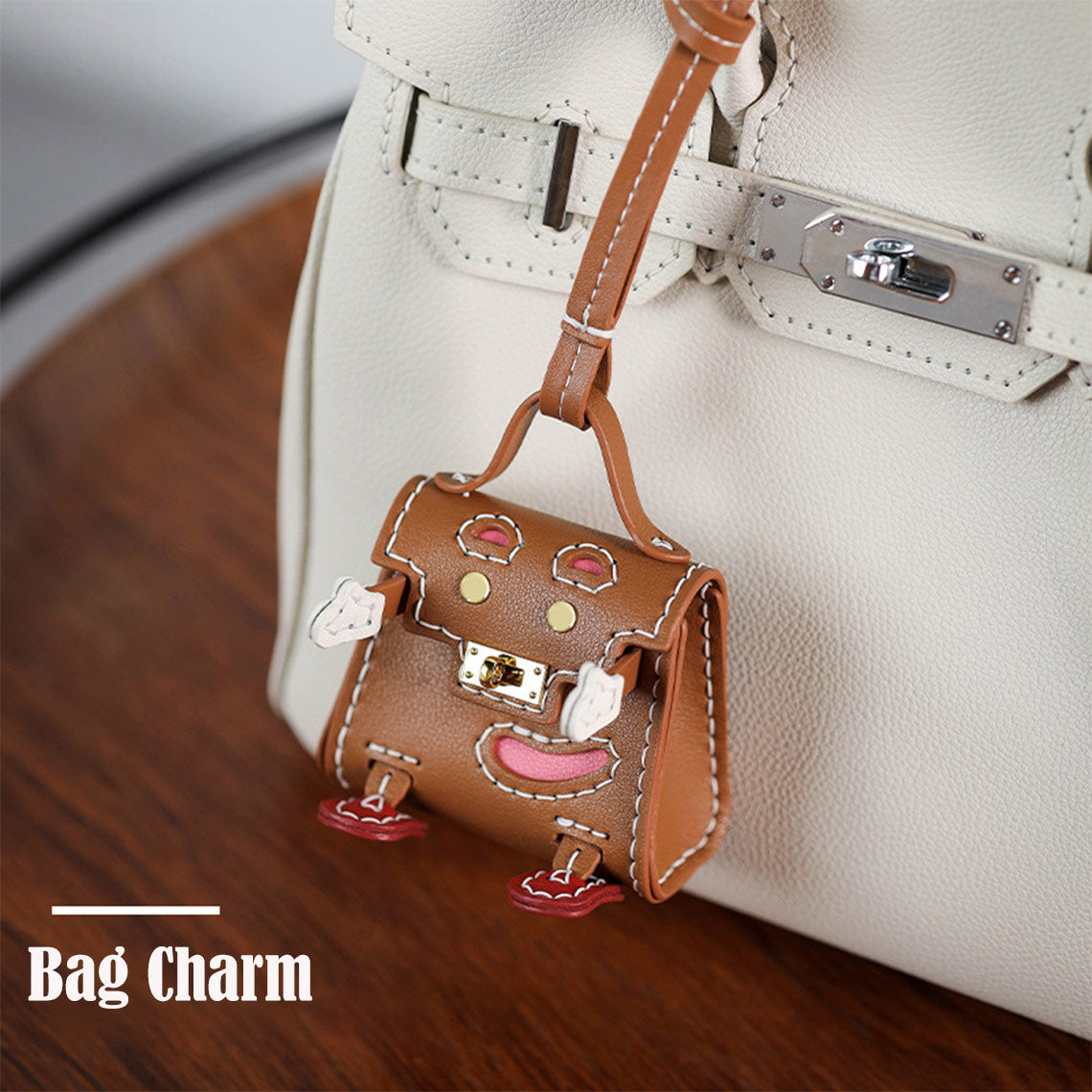 Handsewn Leather Mini Top Handle Bag Charm Keychain in Brown detail image 1