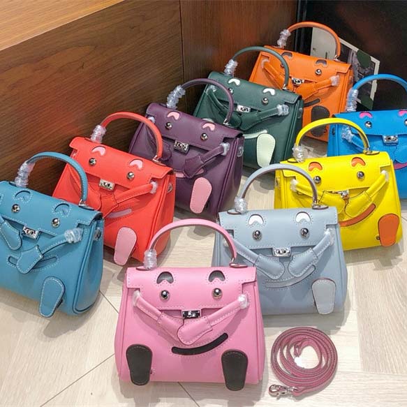 Smile Doll Bag Genuine Leather Mini Handbag with Top Handle and Crossbody Strap detail image 1