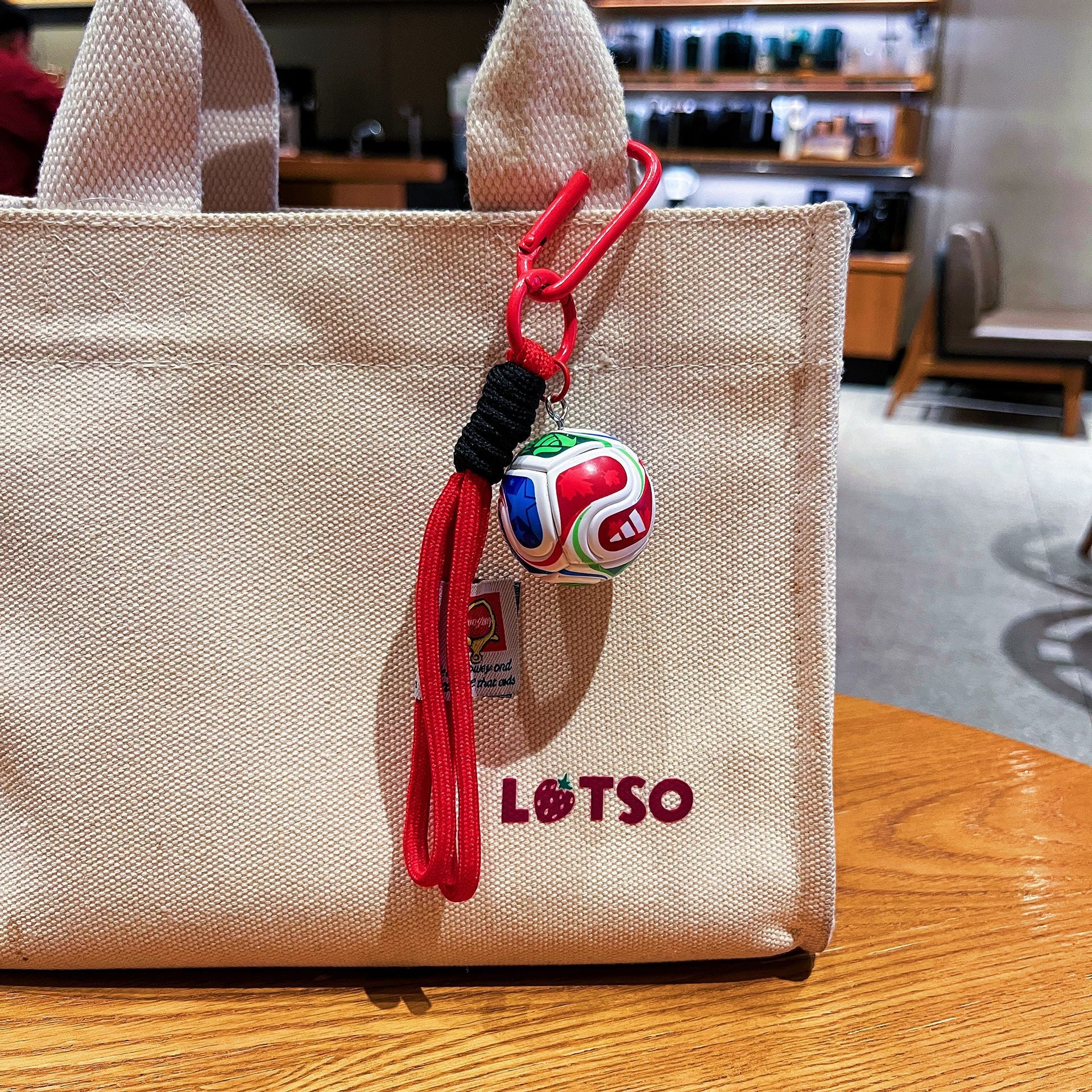 Football Bag Charm Keychain – Red, Yellow, Coffee detail image 2