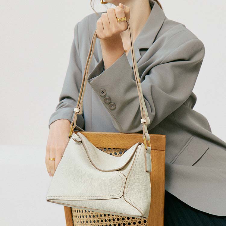Geometric Dumpling Leather Crossbody Bag with Adjustable Strap detail image 8