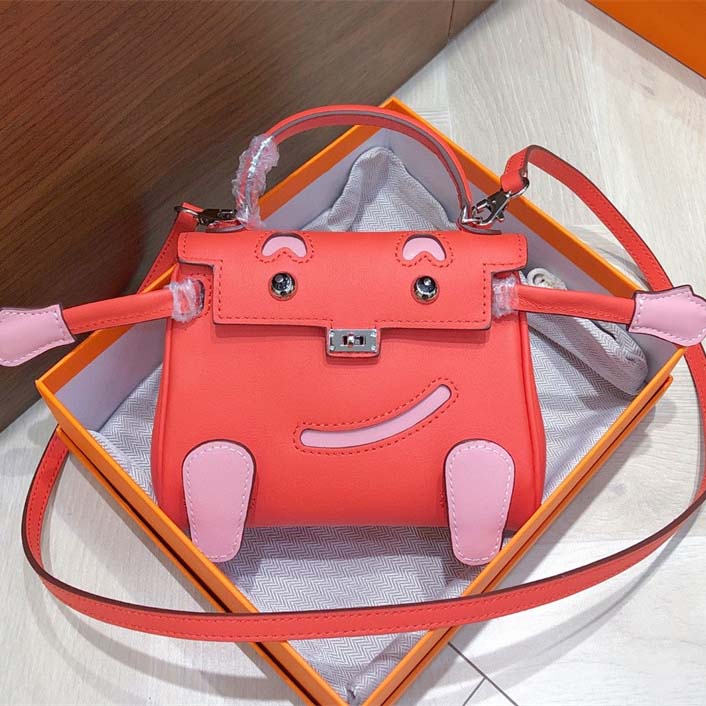 Smile Doll Bag Genuine Leather Mini Handbag with Top Handle and Crossbody Strap detail image 4