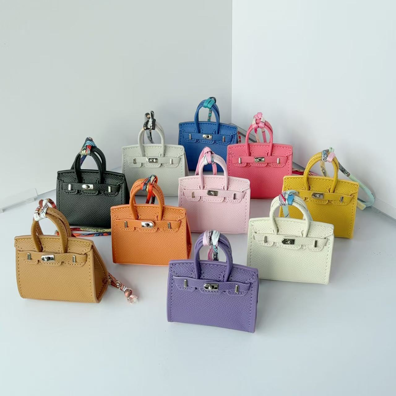 Mini Top Handle Bag Charm Keychain with Earphone Case in PU Leather product image 1