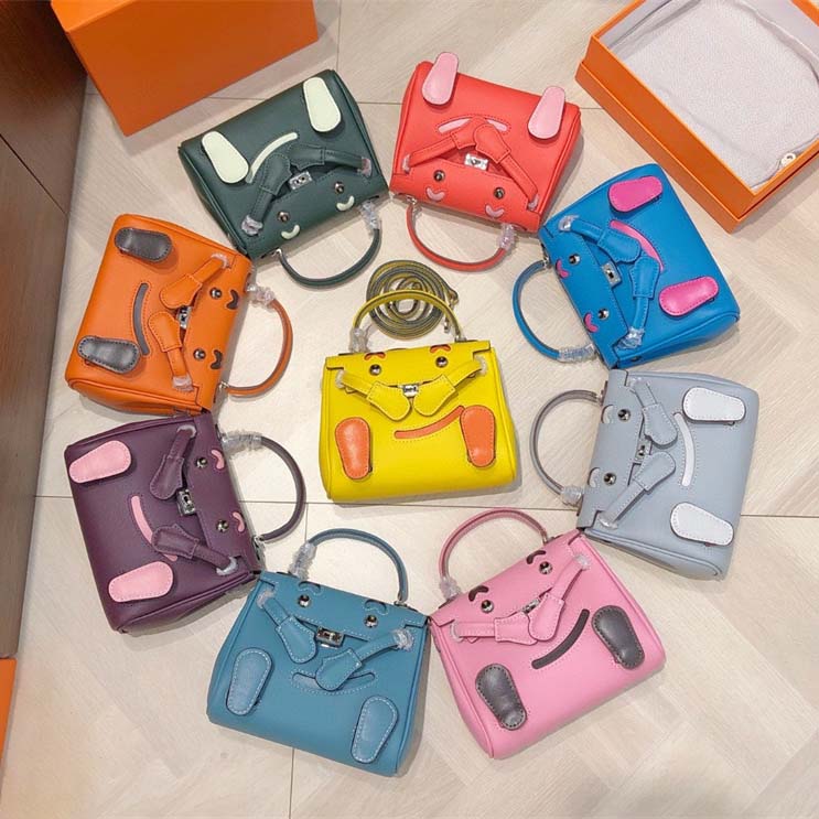 Smile Doll Bag Genuine Leather Mini Handbag with Top Handle and Crossbody Strap detail image 2