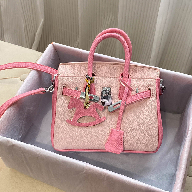 Bi-Color Top Handle Leather Bag in Mini and Small Sizes with Silver Hardware product image 1