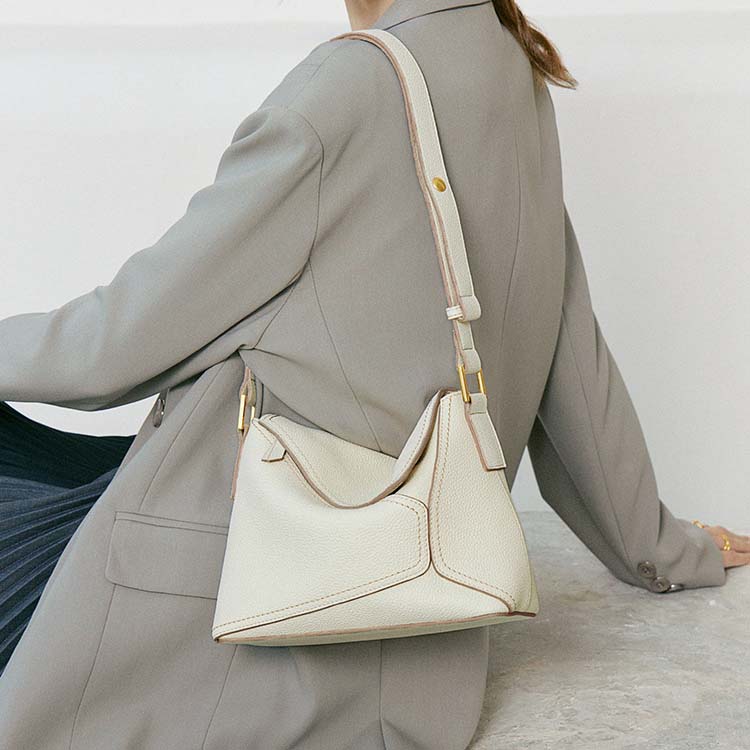 Geometric Dumpling Leather Crossbody Bag with Adjustable Strap detail image 7