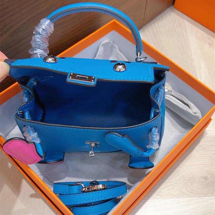 Smile Doll Bag Genuine Leather Mini Handbag with Top Handle and Crossbody Strap detail image 16