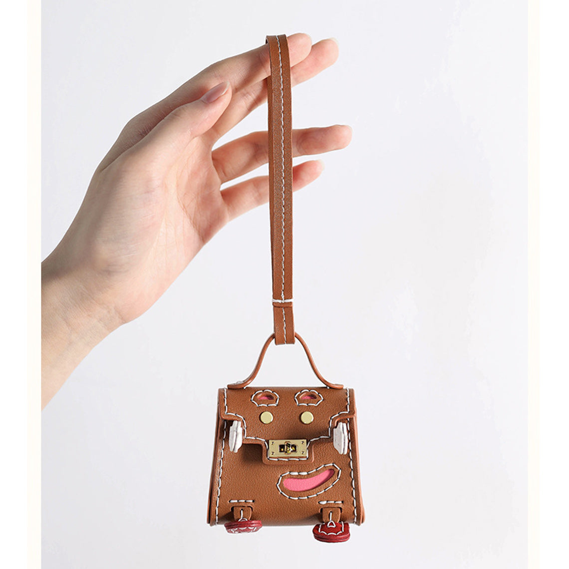 Handsewn Leather Mini Top Handle Bag Charm Keychain in Brown detail image 2