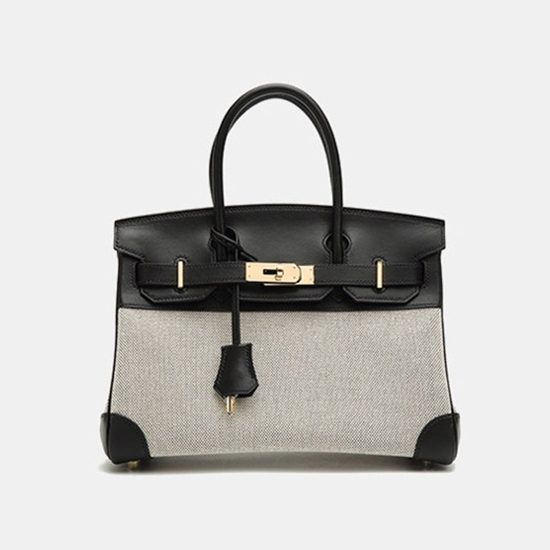 Top Handle Bag in Pebbled Grain Leather & Canvas with Gold-Tone Twist Lock detail image 8
