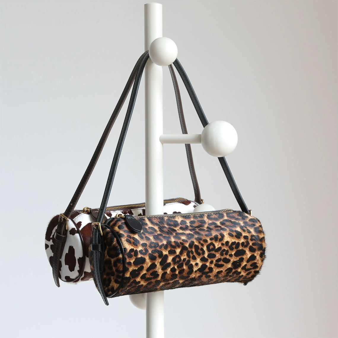 Cylinder Leather Bag with Horse Fur Trim – Cow or Leopard Pattern product image 1