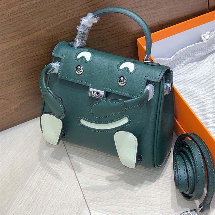 Smile Doll Bag Genuine Leather Mini Handbag with Top Handle and Crossbody Strap detail image 19
