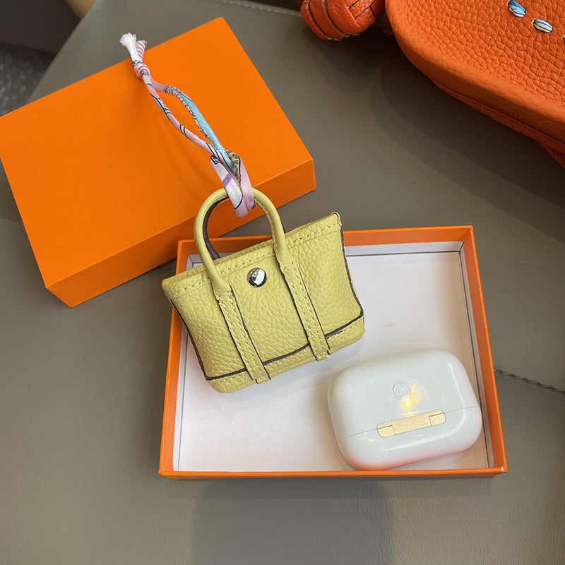 Mini Tote Bag Charm and AirPods Pro Holder in Top Grain Leather detail image 10