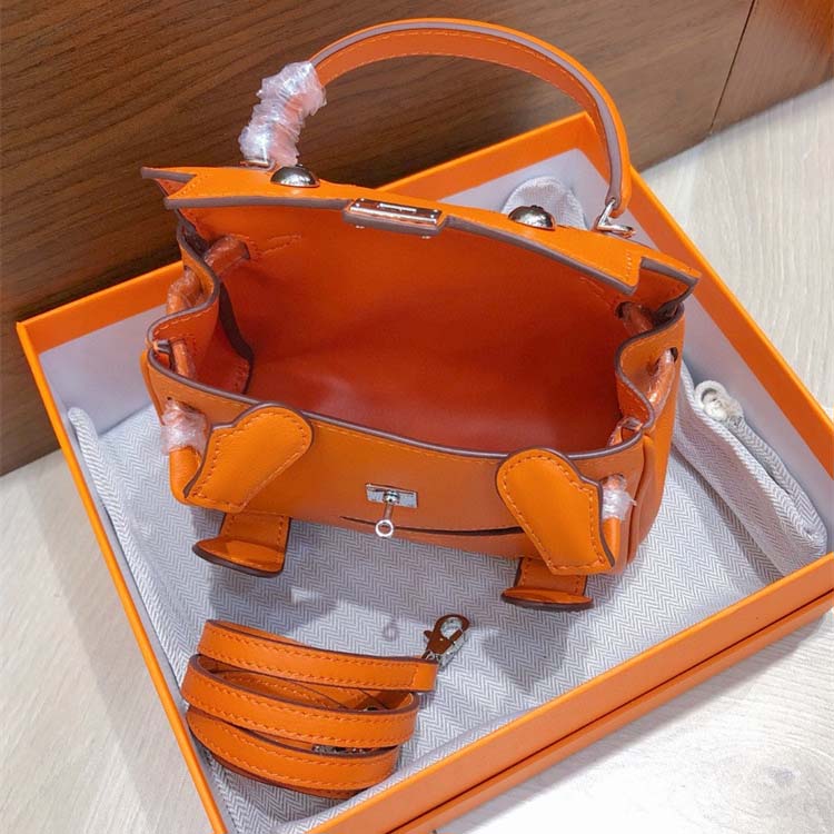 Smile Doll Bag Genuine Leather Mini Handbag with Top Handle and Crossbody Strap detail image 18