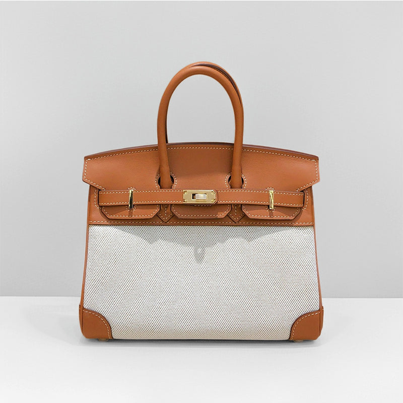 Top Handle Bag in Pebbled Grain Leather & Canvas with Gold-Tone Twist Lock detail image 9