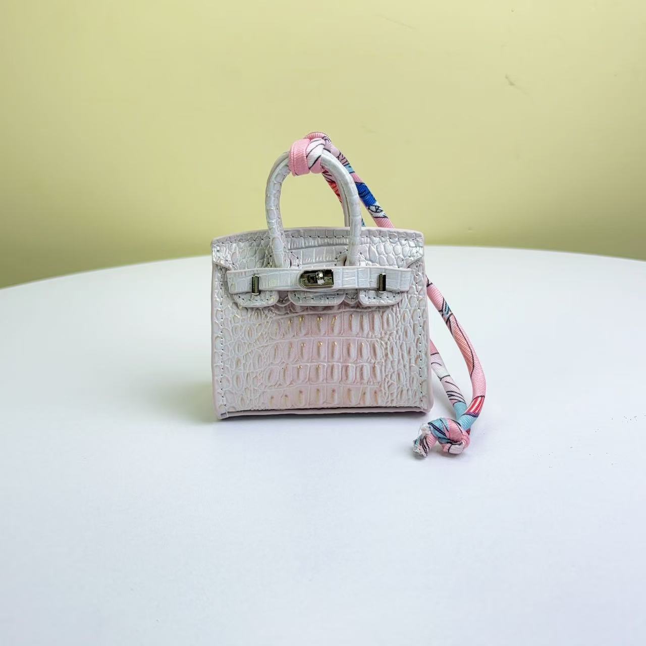 Mini Top Handle Bag Charm in Real Leather – Earphone Case & Keychain detail image 7