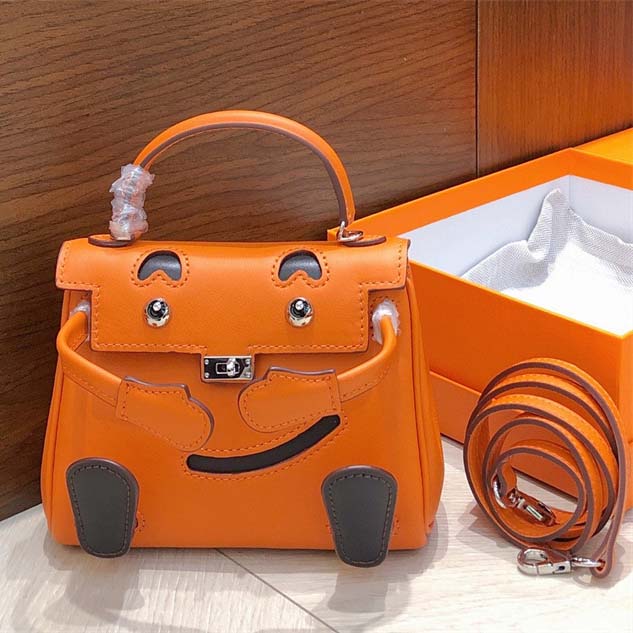 Smile Doll Bag Genuine Leather Mini Handbag with Top Handle and Crossbody Strap detail image 7