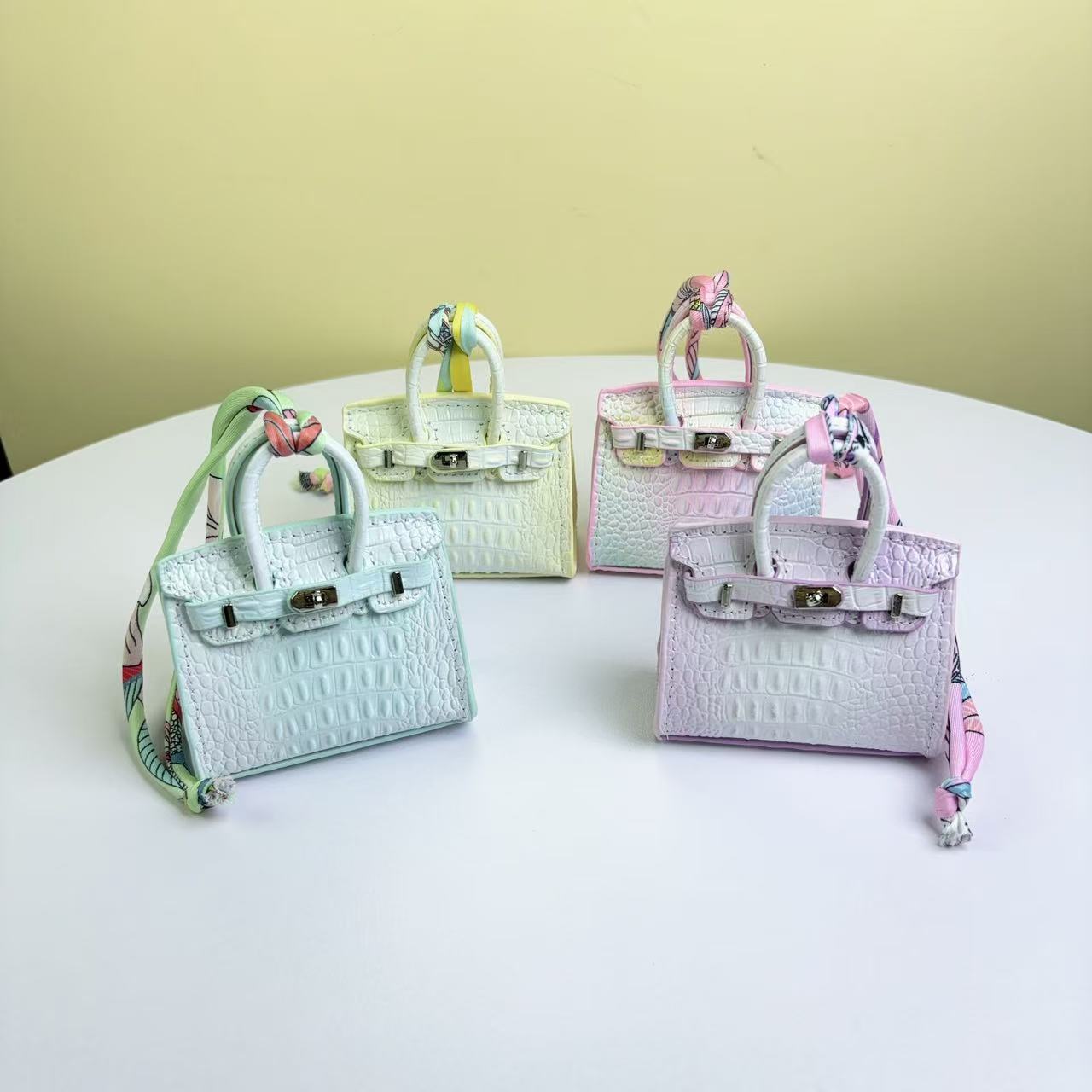 Mini Top Handle Bag Charm in Real Leather – Earphone Case & Keychain product image 1