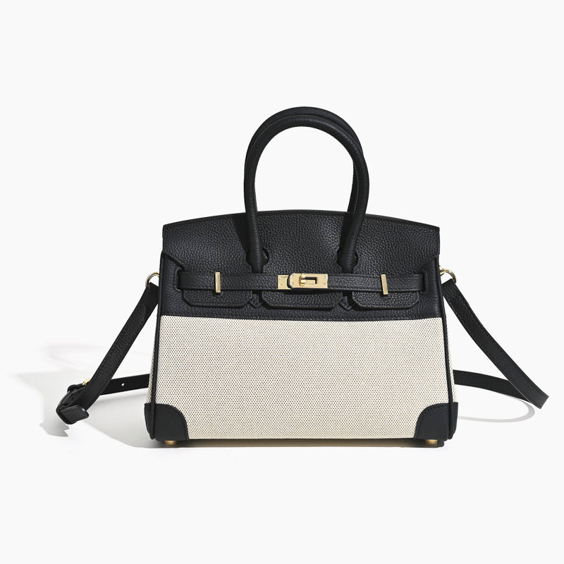 Top Handle Bag in Pebbled Grain Leather & Canvas with Gold-Tone Twist Lock detail image 5