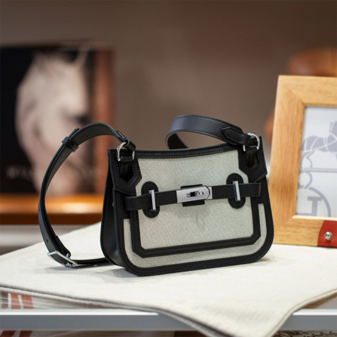 Canvas and Leather Mini Messenger Crossbody Bag in Black, Rouge, Deep Grey, Brown product image 1
