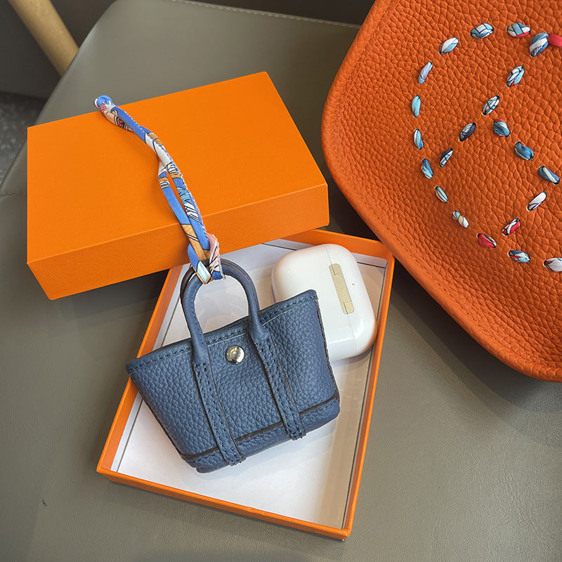 Mini Tote Bag Charm and AirPods Pro Holder in Top Grain Leather detail image 14