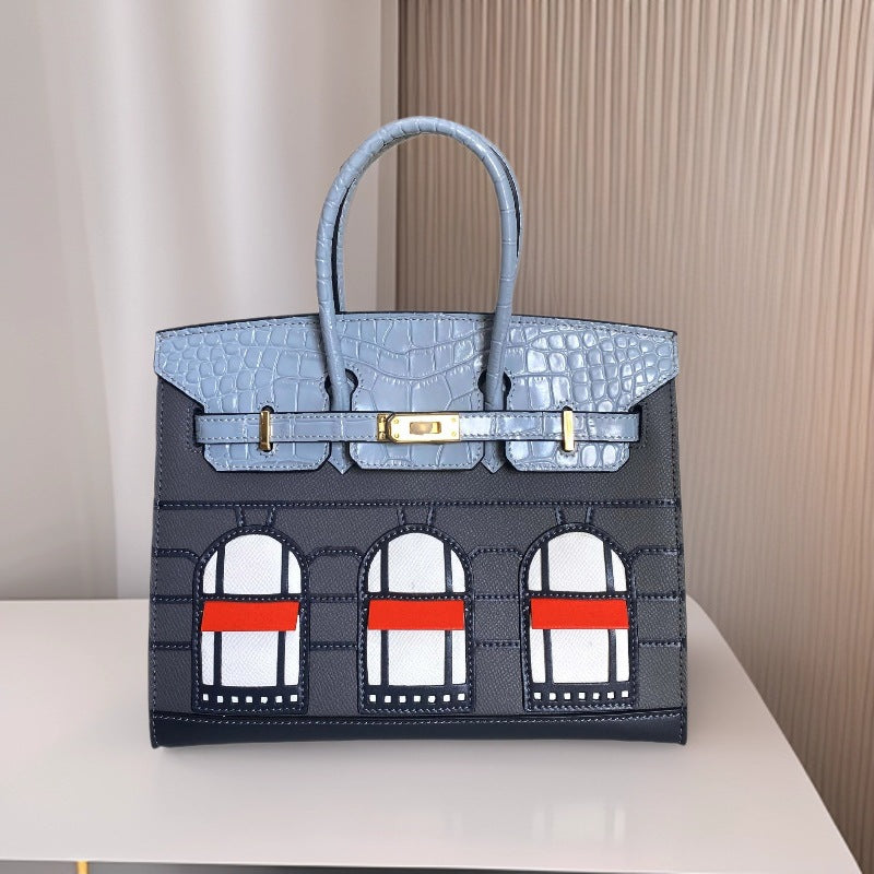 House-Shaped Top Handle Bag in Pebbled Grain Leather – Three Sizes detail image 17
