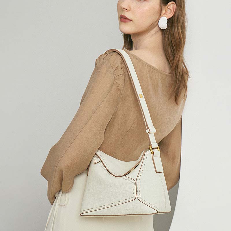 Geometric Dumpling Leather Crossbody Bag with Adjustable Strap detail image 17